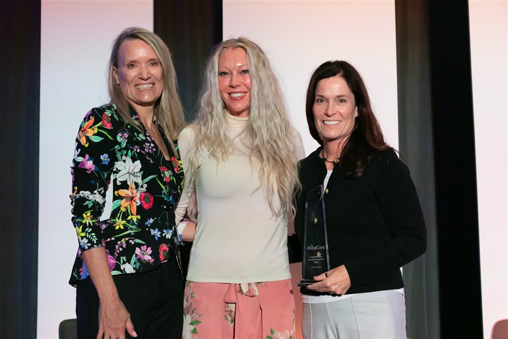 Sheila Iacono, Vice President of Nursing Operations, and Jana Matney, Nursing Operations Manager accept AlayaCare’s 2025 Angela Brewer Excellence Award.